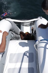 a man sitting on a boat