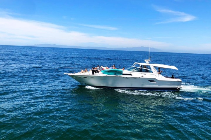 a small boat in a large body of water