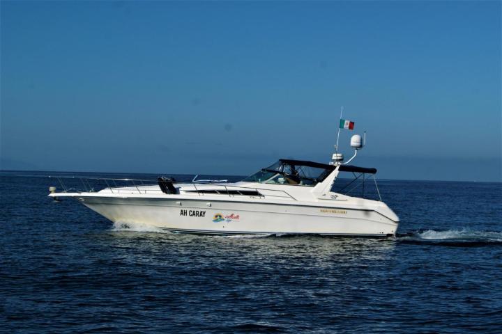 a small boat in a body of water