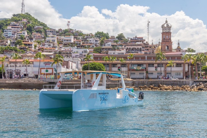 a small boat in a large body of water